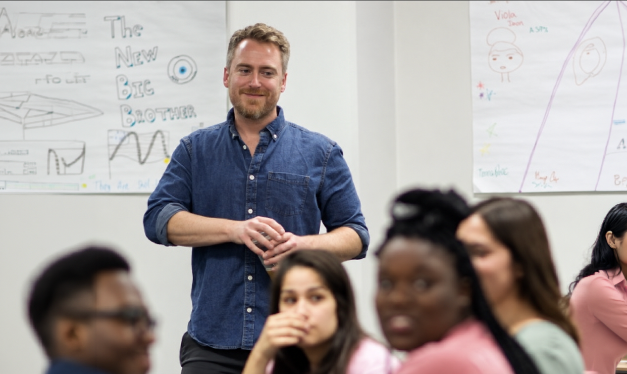 Nick J. Manley teaching in a classroom with students